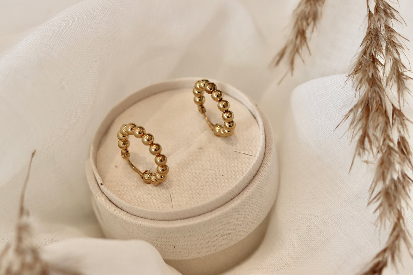 Guld øreringe elegante