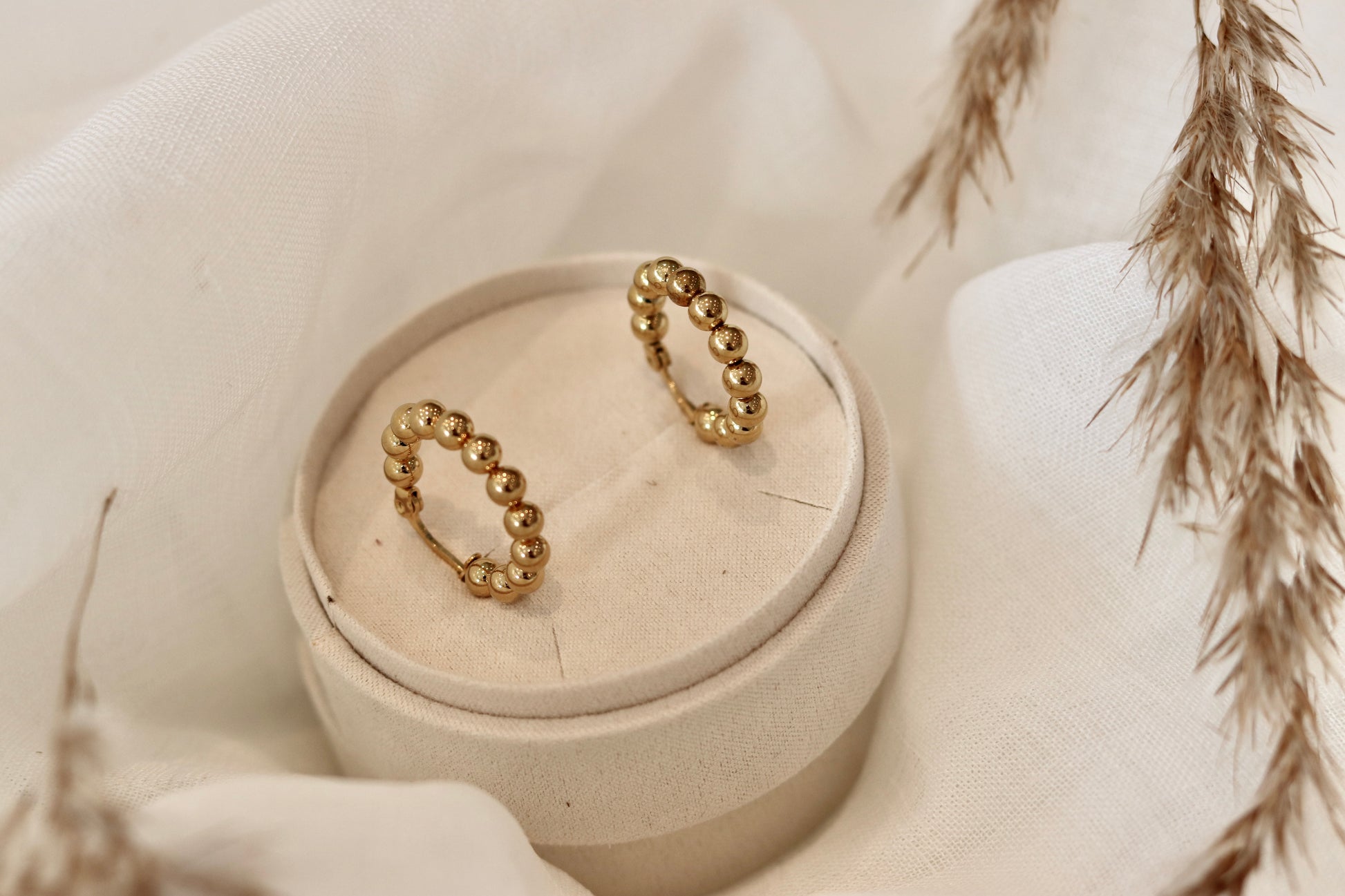 Guld øreringe elegante