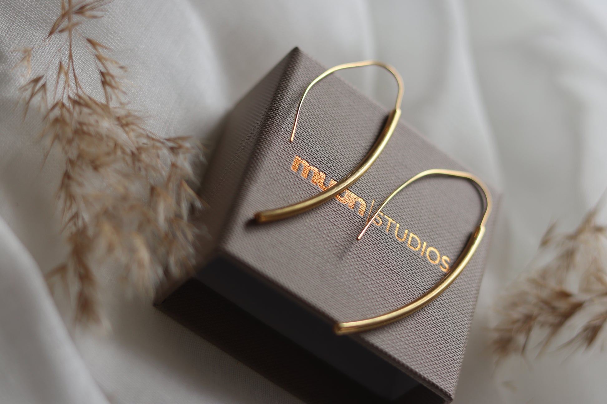 Guld øreringe enkle